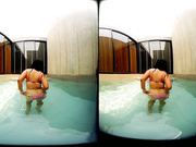 Girl with big tits in the pool